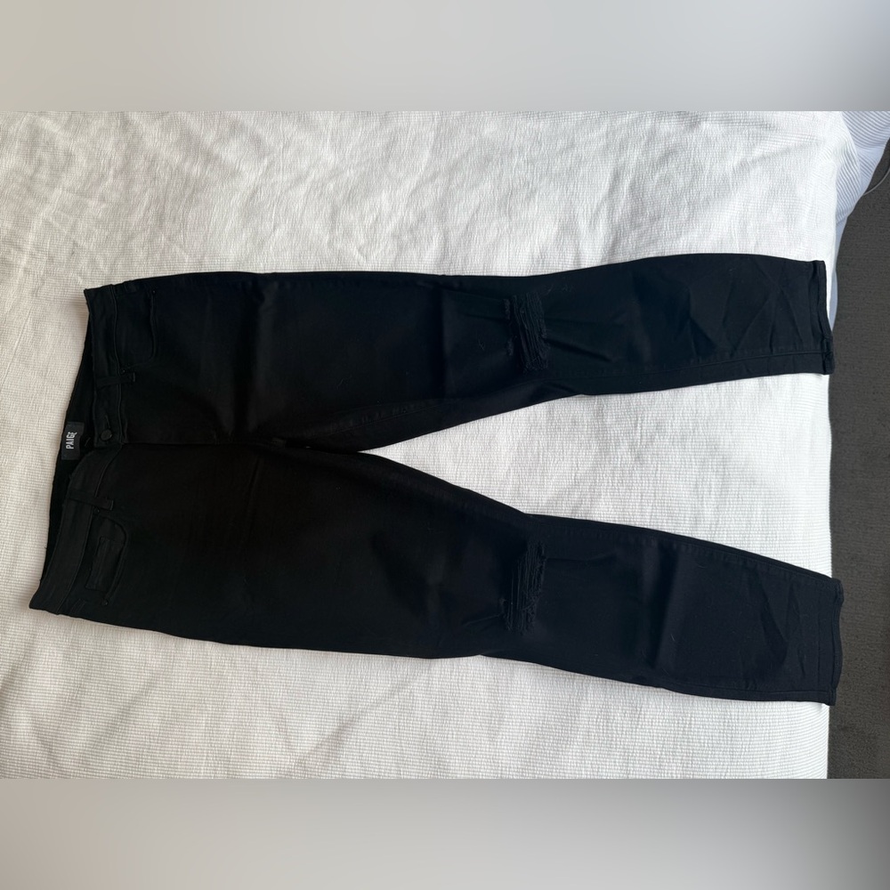 Black Paige skinny jeans with ripped knees